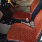 Clean car interior with brown leather seats – Tour operator Madurai with tour package